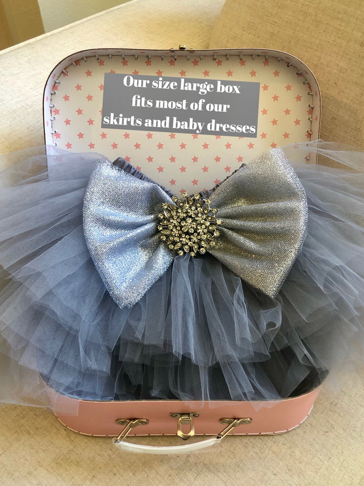 Size large box open with a gray glitter bow tutu placed inside